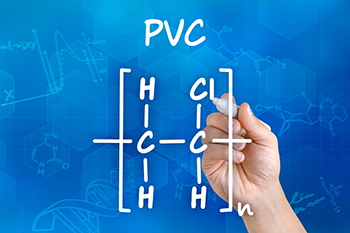 an illustration of  a hand writing the checmical formula for PVC 