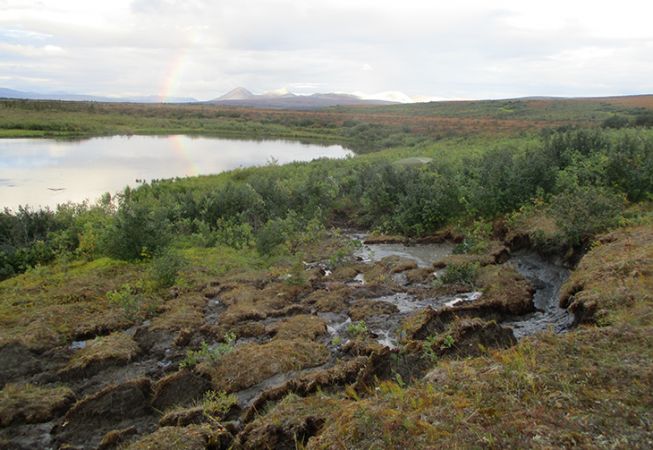 730_thawing_permafrost_hill_rainbow_methane.png