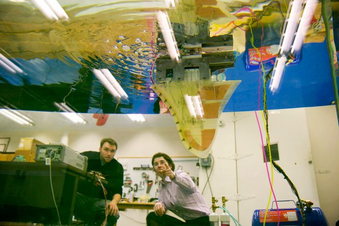 Hilary Bart-Smith (right) and a coworker observe a swimming robot inspired by the cownose ray. Credit: Hilary Bart-Smith