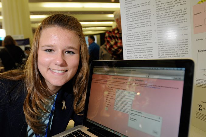 Brittany Wenger, 18, can run her computer program for evaluating a breast cancer test on her laptop. Her program improves doctors’ ability to interpret a simple, relatively painless test. Credit: Chris Ayers Photography/SSP