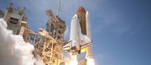 The space shuttle Atlantis lifts off in May 2010, headed for the International Space Station more than 200 miles above Earth.