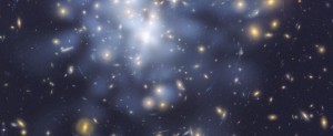 The ghostly blue clouds in the center of the Abell 1689 galaxy cluster show where Dan Coe and his team think dark matter is hiding. Abell 1689 is home to about 1,000 galaxies and trillions of stars. Credit: NASA, ESA, and Dan Coe (NASA JPL/Caltech and STScI)