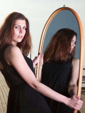 girl looking mirror