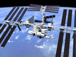 The International Space Station, illustrated here, is about the width and length of a football field. Shuttles often delivered astronauts, supplies and tools to the station.