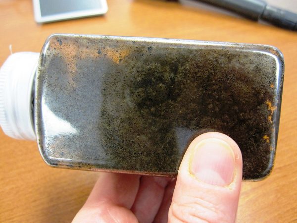 This bottle of raw bitumen shows its consistency before it is diluted. Credit: Sharon Oosthoek