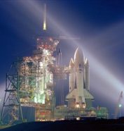 In March 1981, the space shuttle Columbia awaits liftoff at the Kennedy Space Center in Florida.