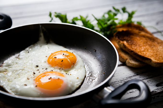 frying eggs