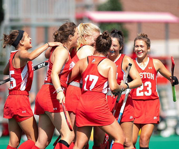 a photo of the BU woman's field hockey team wearing trackers