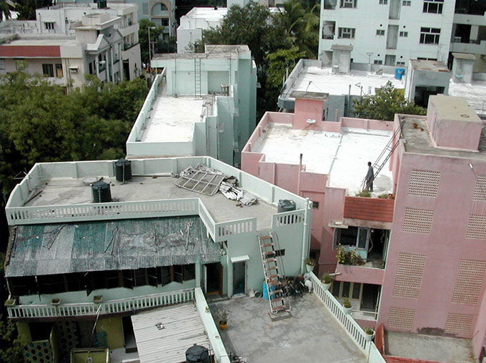 a photo of rooftops painted white