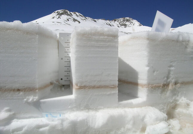 a picture of layers of dust in snow