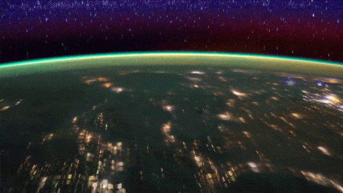 an animated image showing the earth as seen from the ISS during a night flyover