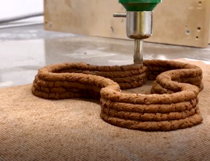 a demo of 3D printing using soil based material