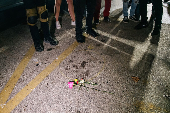 a photo of roses on a street 