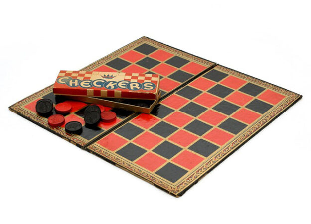 a photo of a checkers board and checkers pieces