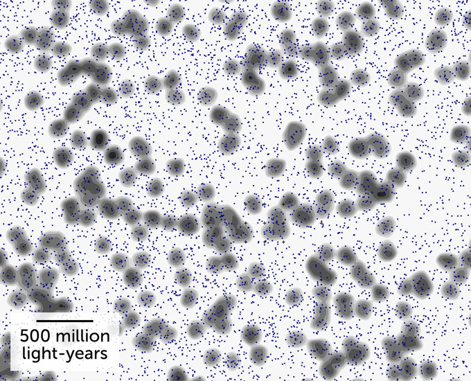 image of blue dots that signify quasars with dark halo spots