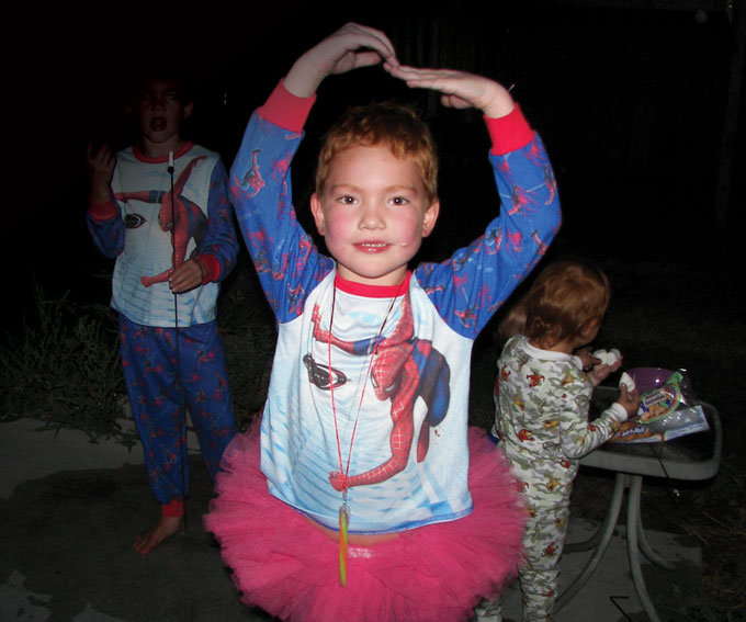 image of Kyla Lechelt wearing a tutu and a spiderman shirt