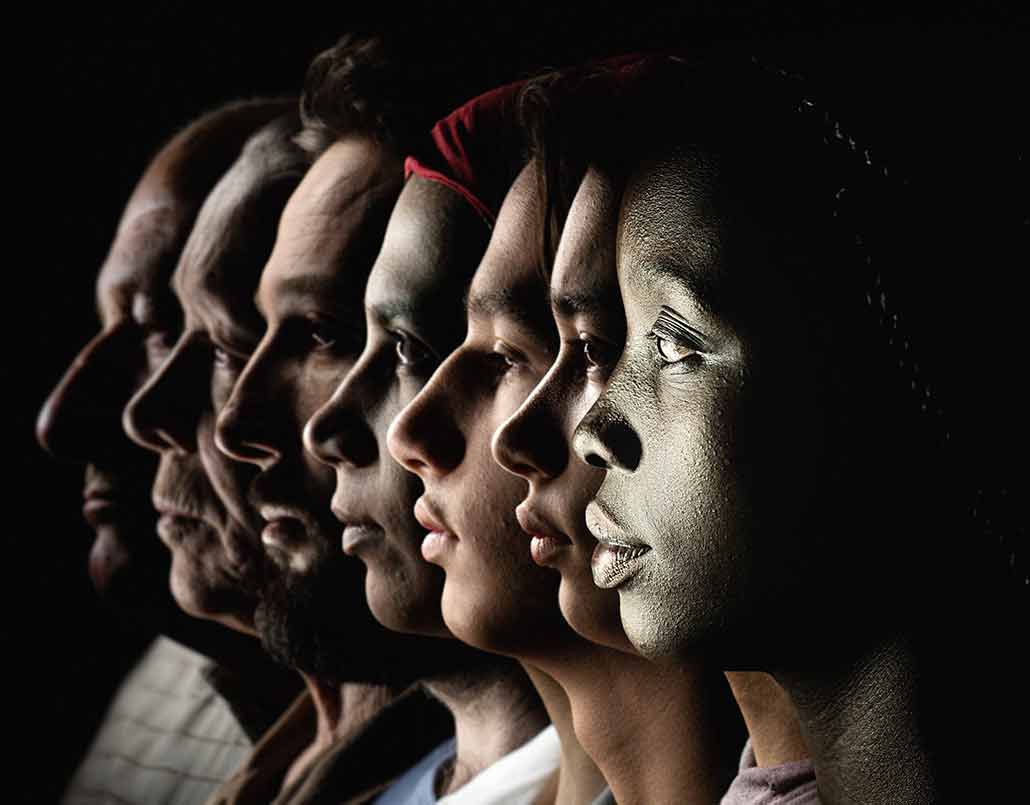 a line of six adults in profile against a dark background. Their faces represent various ages, genders, and ethnicities