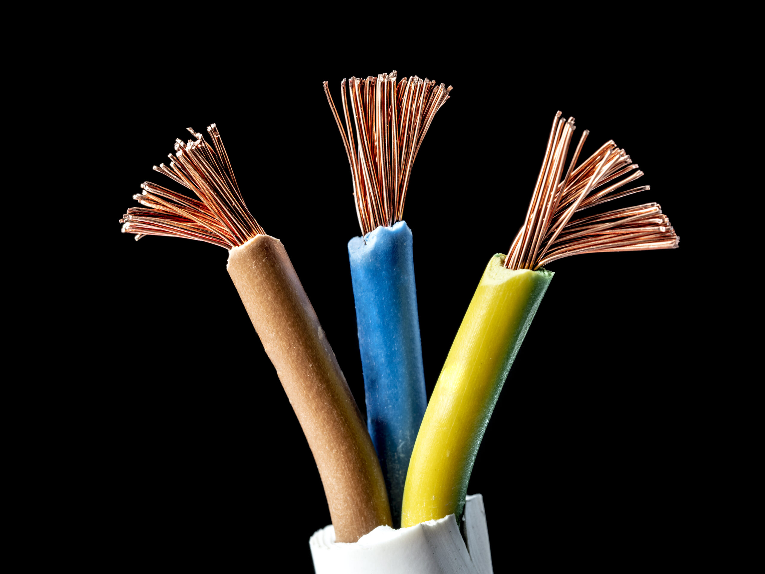 three power cables wrapped in orange, blue and yellow plastic with copper wires fraying at the ends