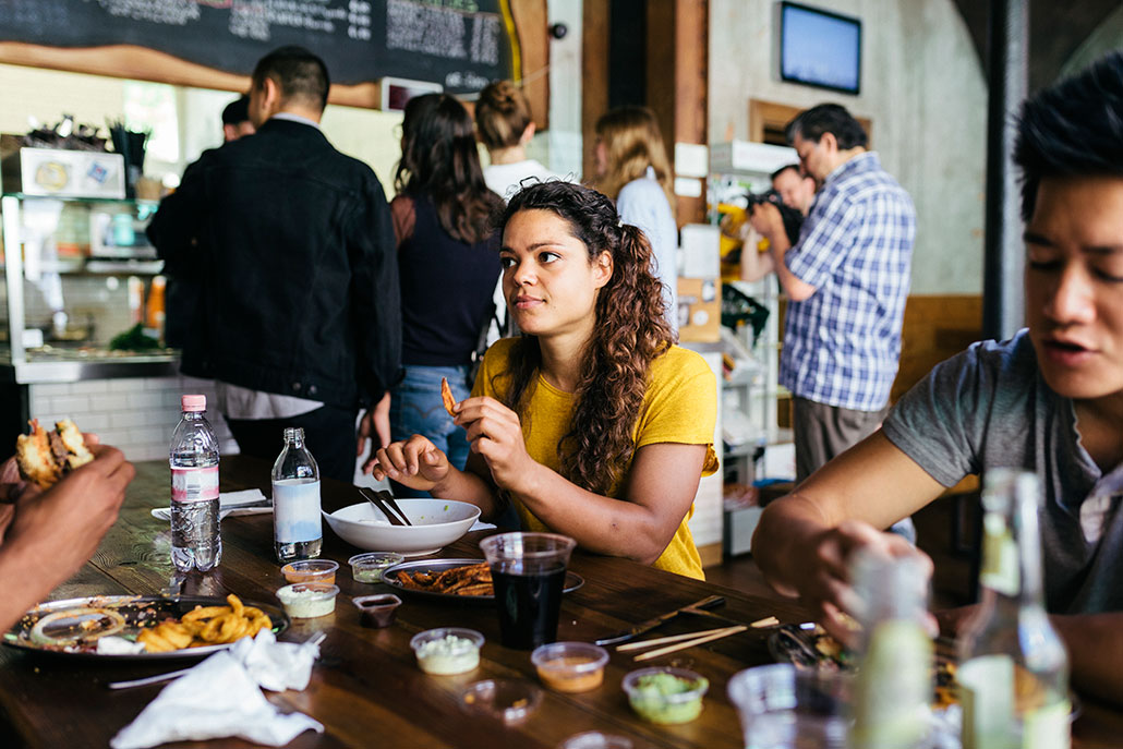 people eating inside a restaurant