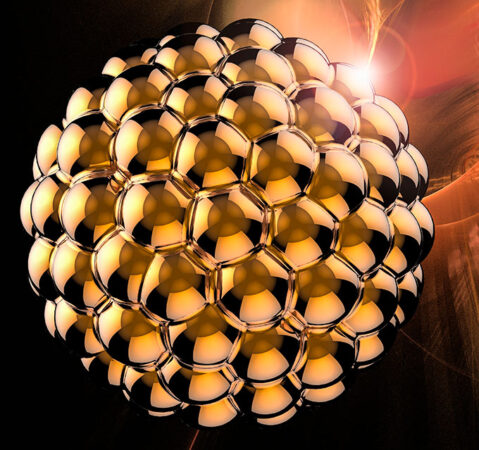 an illustration showing a gold nanoparticle, with gold atoms clumped together into a sphere