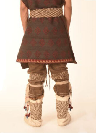 photo of a model wearing a woven reproduction of Turfan Man's outfit