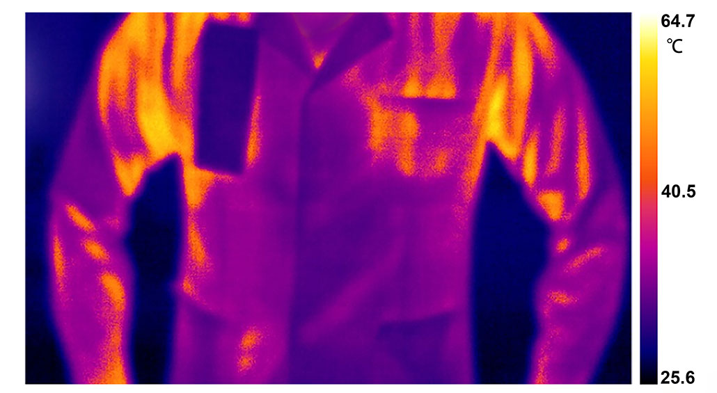 an infrared picture of a person wearing a jacket lined with the new material