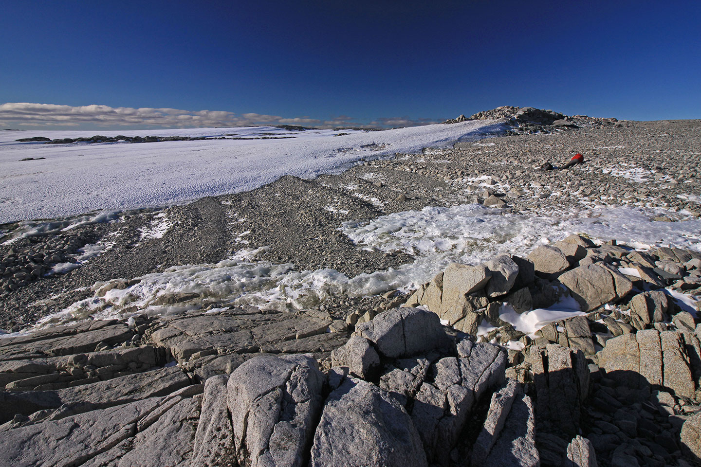 a photo showing rocky terrain, small ridges in the rocks run diagonally across the picture